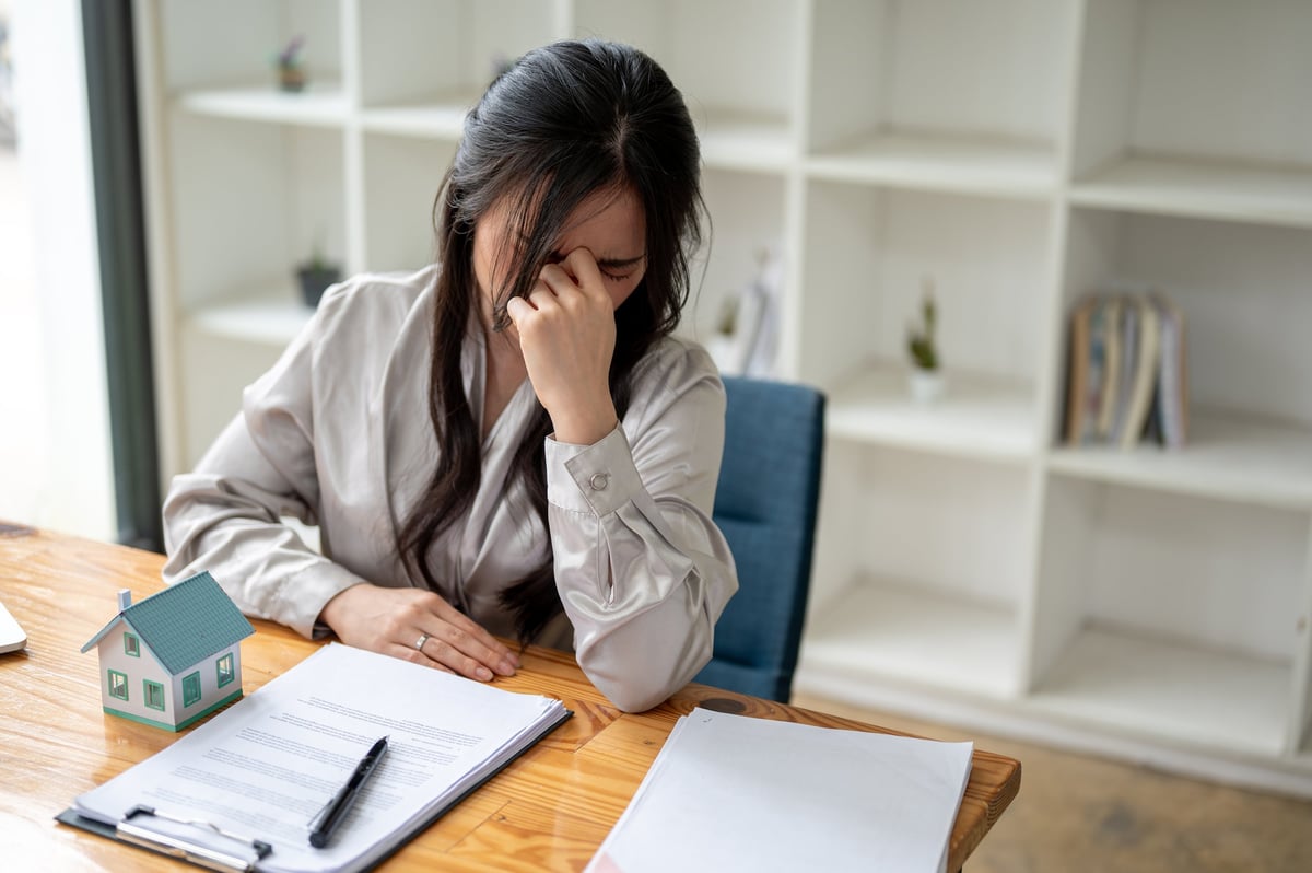 Property manager at a desk with a busy schedule