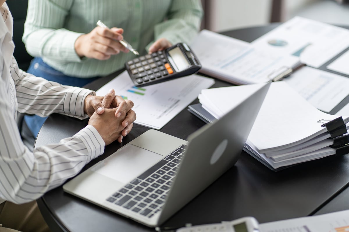 Accountant reviewing a company's annual financial statements and profit and loss report