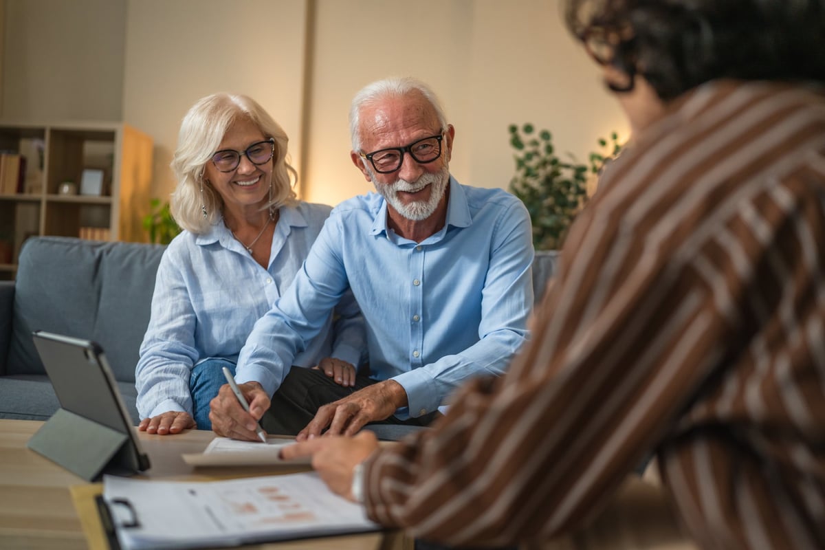 Financial adviser meeting with clients to discuss mortgage options
