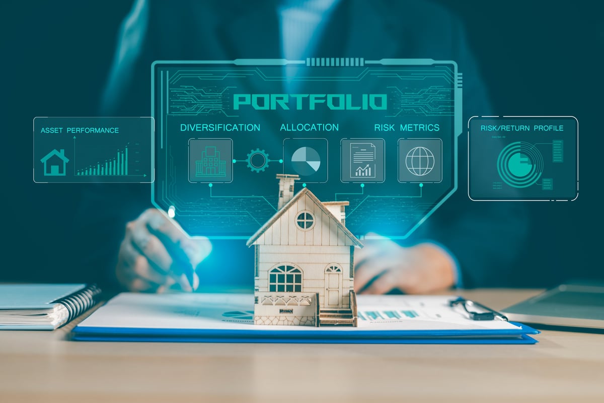 Real estate portfolio dashboard investor reviews house model on documents with digital HUD charts for diversification, allocation and risk metrics, tracking asset performance and return.